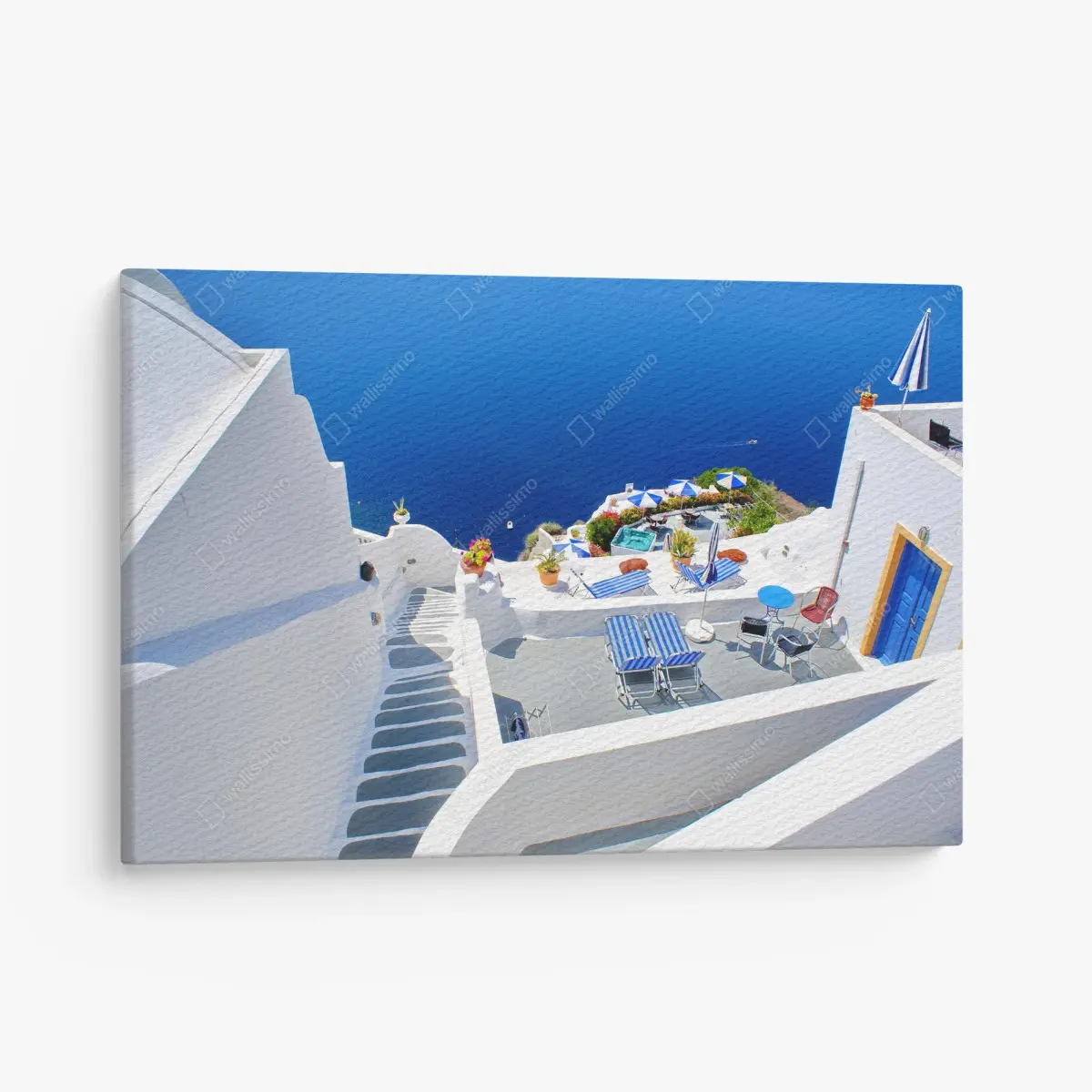 Leinwandbild Santorini weiße terrassen über dem tiefblauen meer – Pixers®