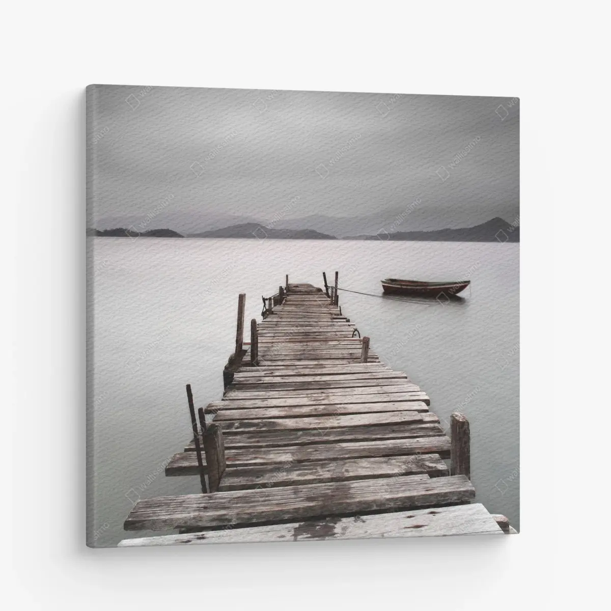 Leinwandbild einsamer steg und boot über ruhigem meer – Pixers®